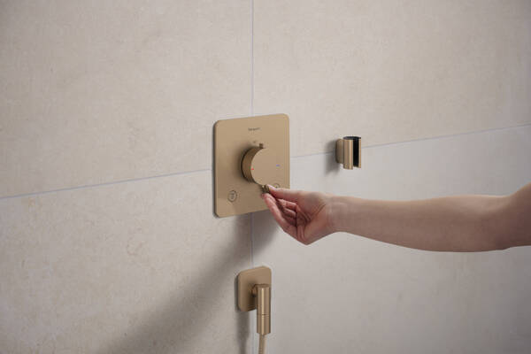 Настенная розетка с обратным клапаном Hansgrohe FixFit Fine Q 28884140. матовая бронза 28884140